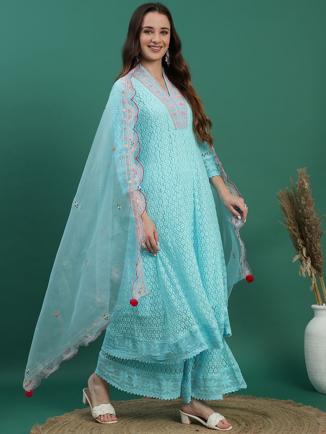 

Ramas Women Ethnic Motifs Embroidered Regular Sequinned Kurta with Sharara & With Dupatta, Turquoise blue