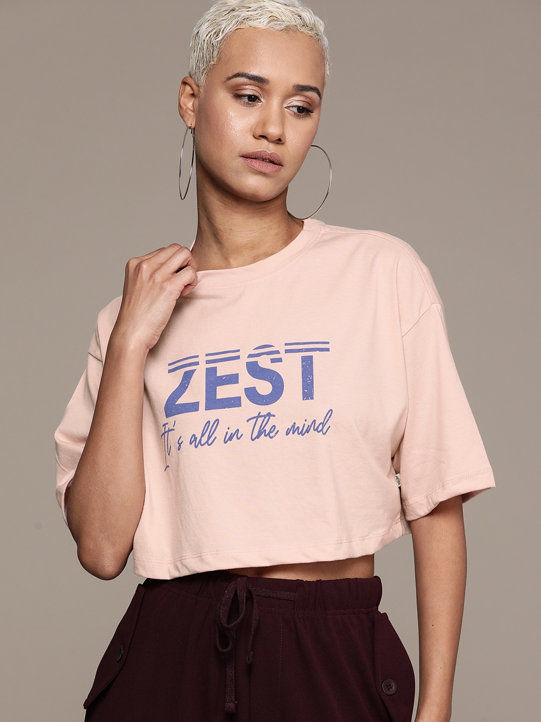 

The Roadster Lifestyle Co. Typography Printed Drop-Shoulder Sleeves Cropped Boxy T-shirt, Peach