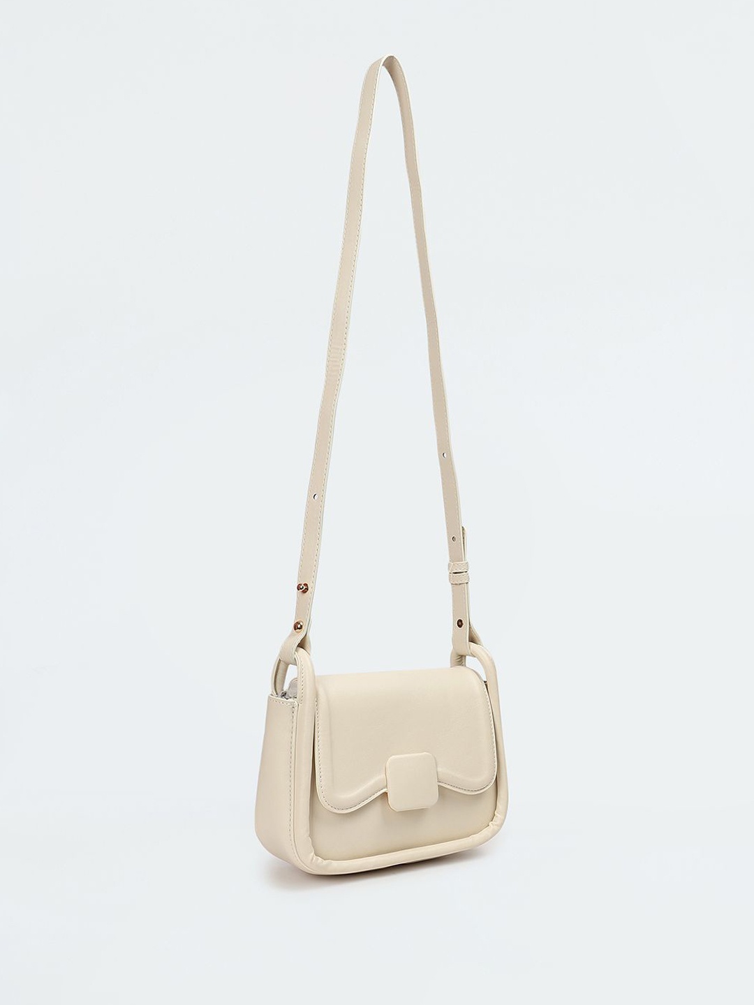 

max Women Solid Structured Sling Bag, Cream