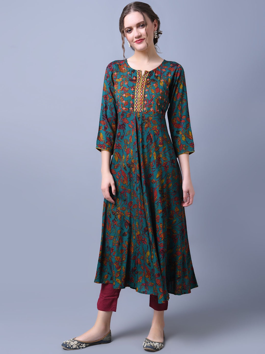 

Anouk Turquoise Blue Floral Printed Notch Neck Thread Work Liva A-Line Kurta