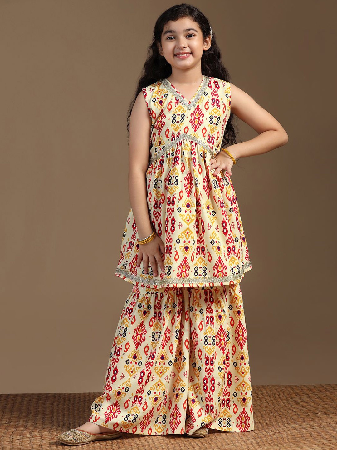 

FASHION DREAM Girls Ethnic Motifs Printed A-Line Kurta With Sharara, Yellow