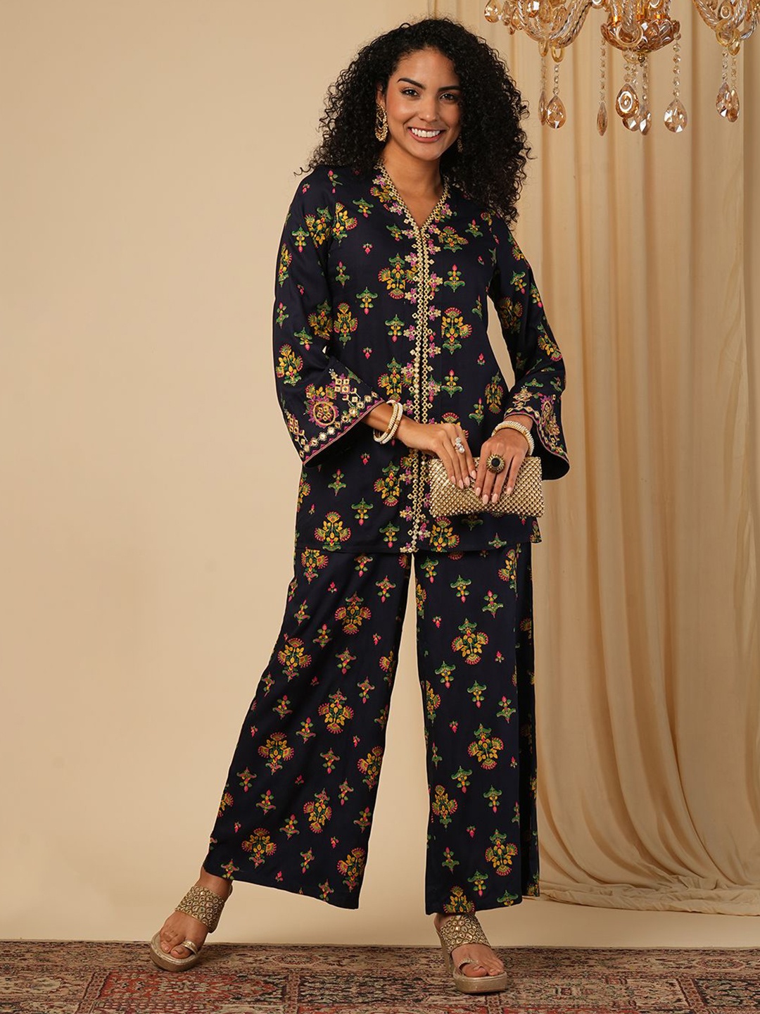 

Globus Navy Blue Ethnic Motifs Printed Mirror Work Bell Sleeves Top With Trousers