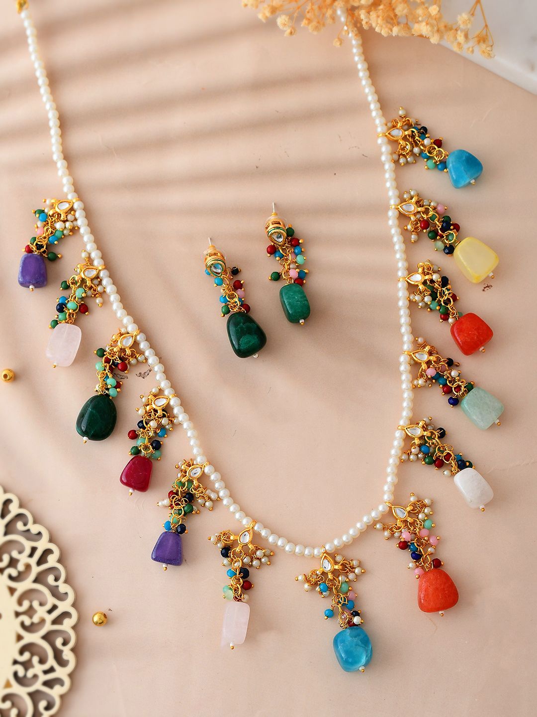 

Silvermerc Designs Gold Plated Kundan Studded & Pearls Beaded Jewellery Set