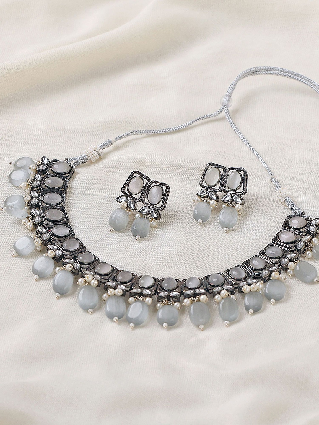 

BeAbhika Silver Plated Stone Studded Necklace & Earrings