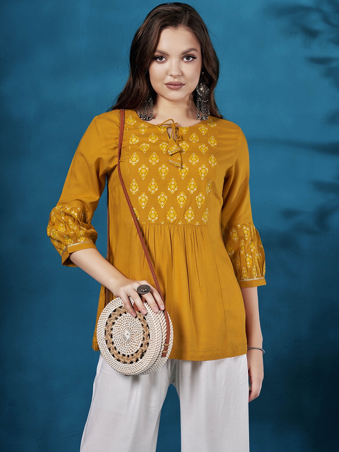 

Anouk Mustard Yellow Ethnic Motifs Printed Tie-Up Neck A-Line Kurta