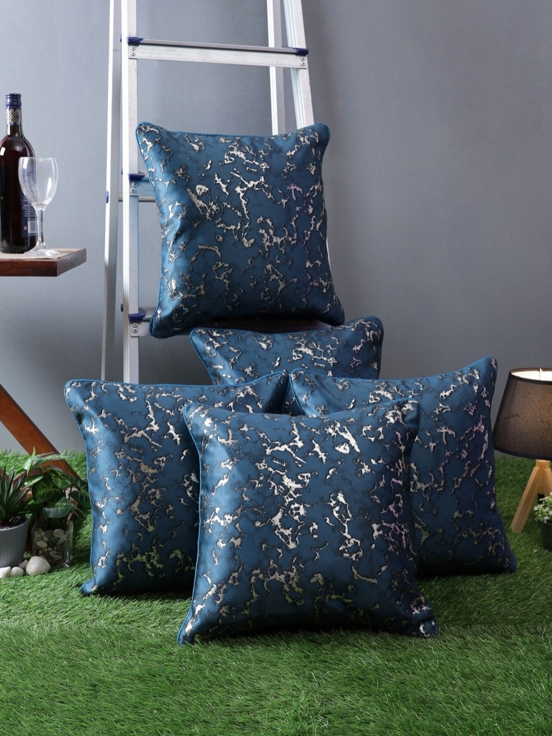 

Myntra Elegant Homes Blue & Silver-Toned 5 Pieces Abstract Square Cushion Covers