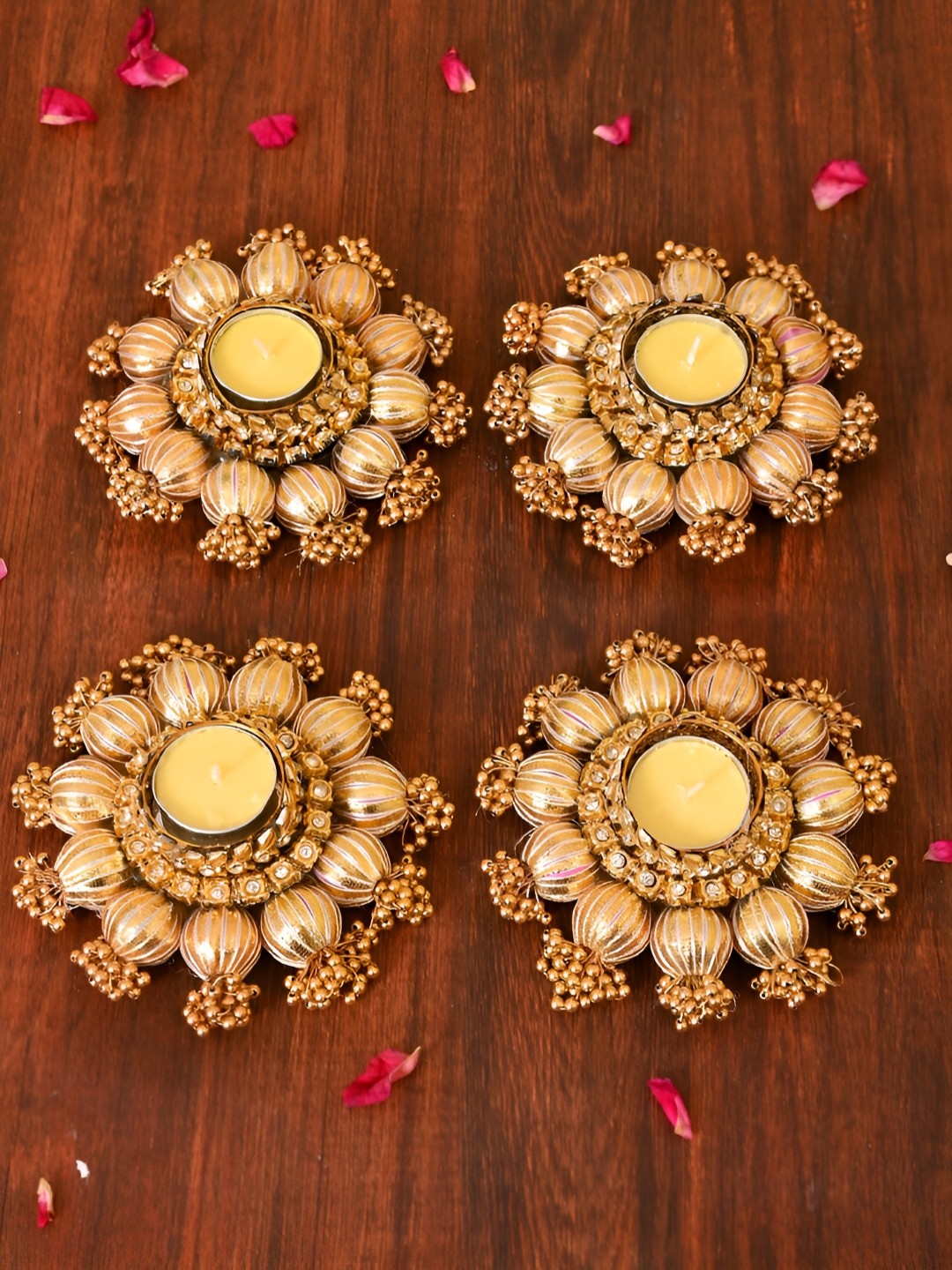 

Aapno Rajasthan Gold-Toned 4 Pieces Floral Diyas Candle Holder