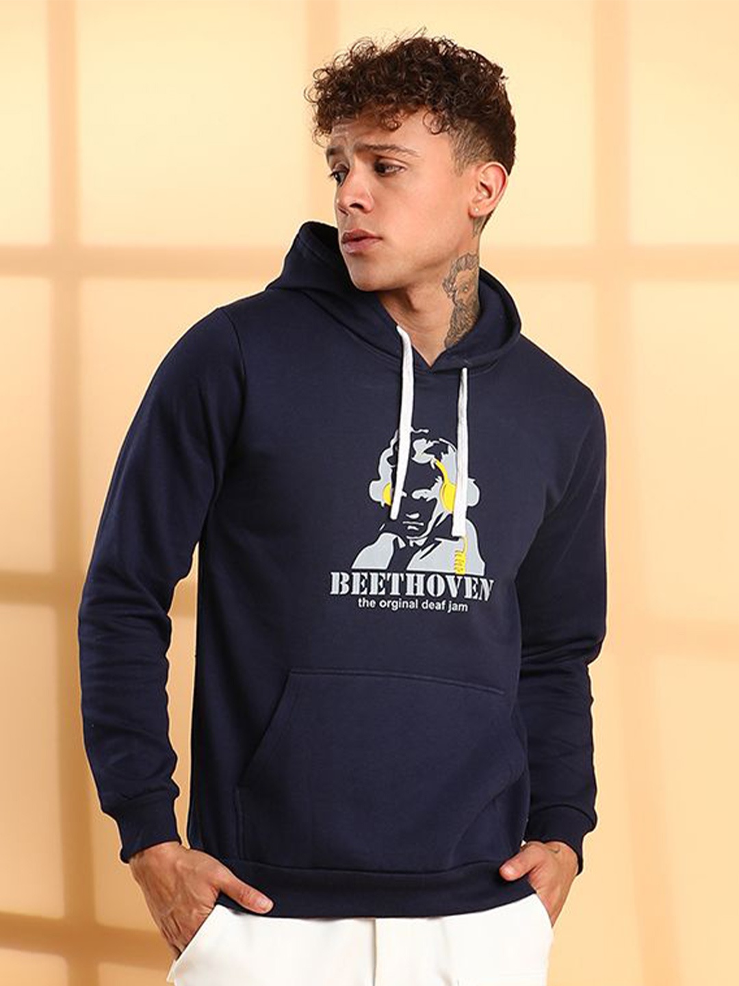 

Campus Sutra Men Graphic Printed Hooded Sweatshirt, Navy blue