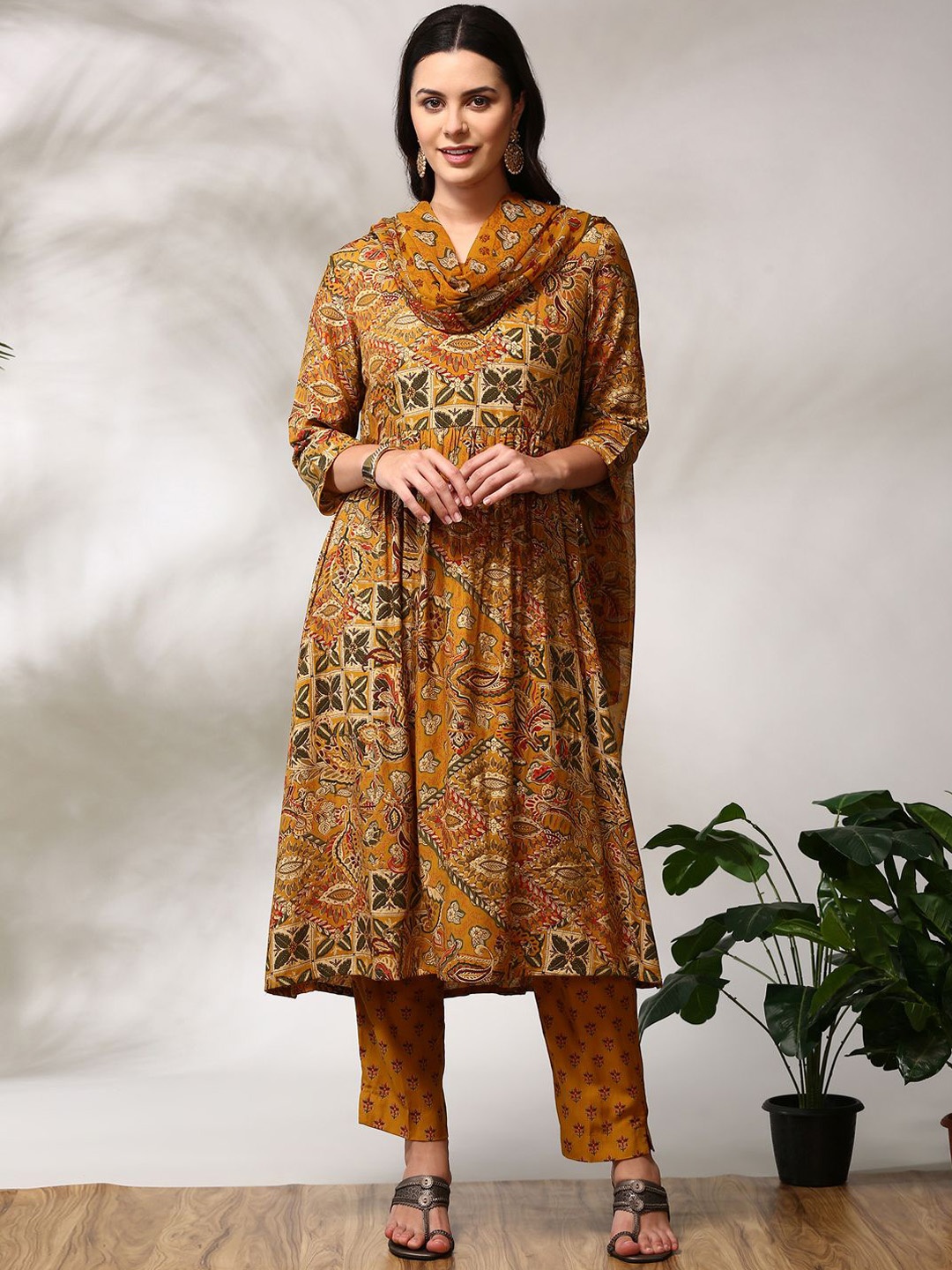 

Anouk Mustard Floral Printed A-Line Kurta With Trouser & Dupatta