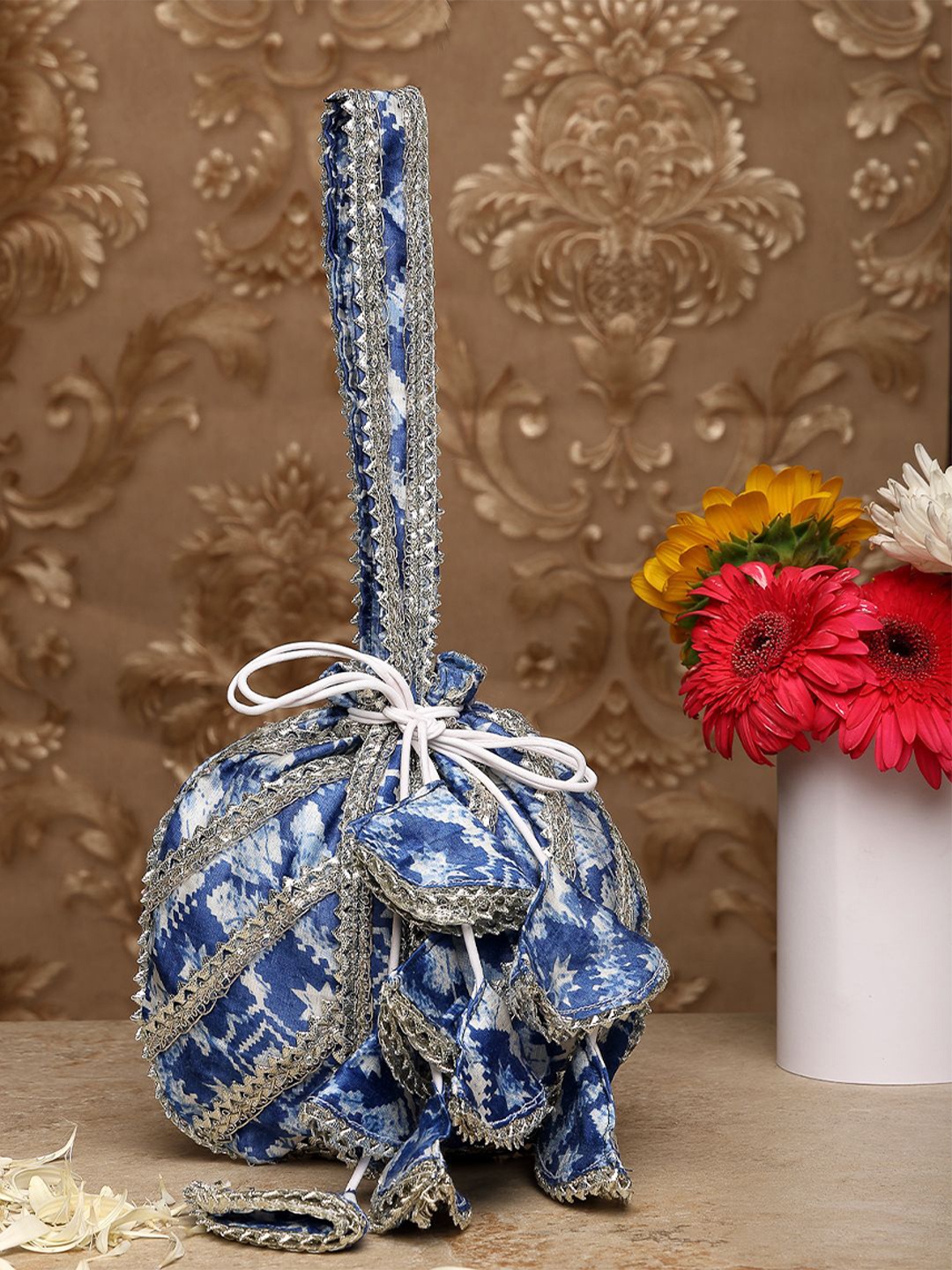

Dhrohar Embellished Potli Clutch, Blue