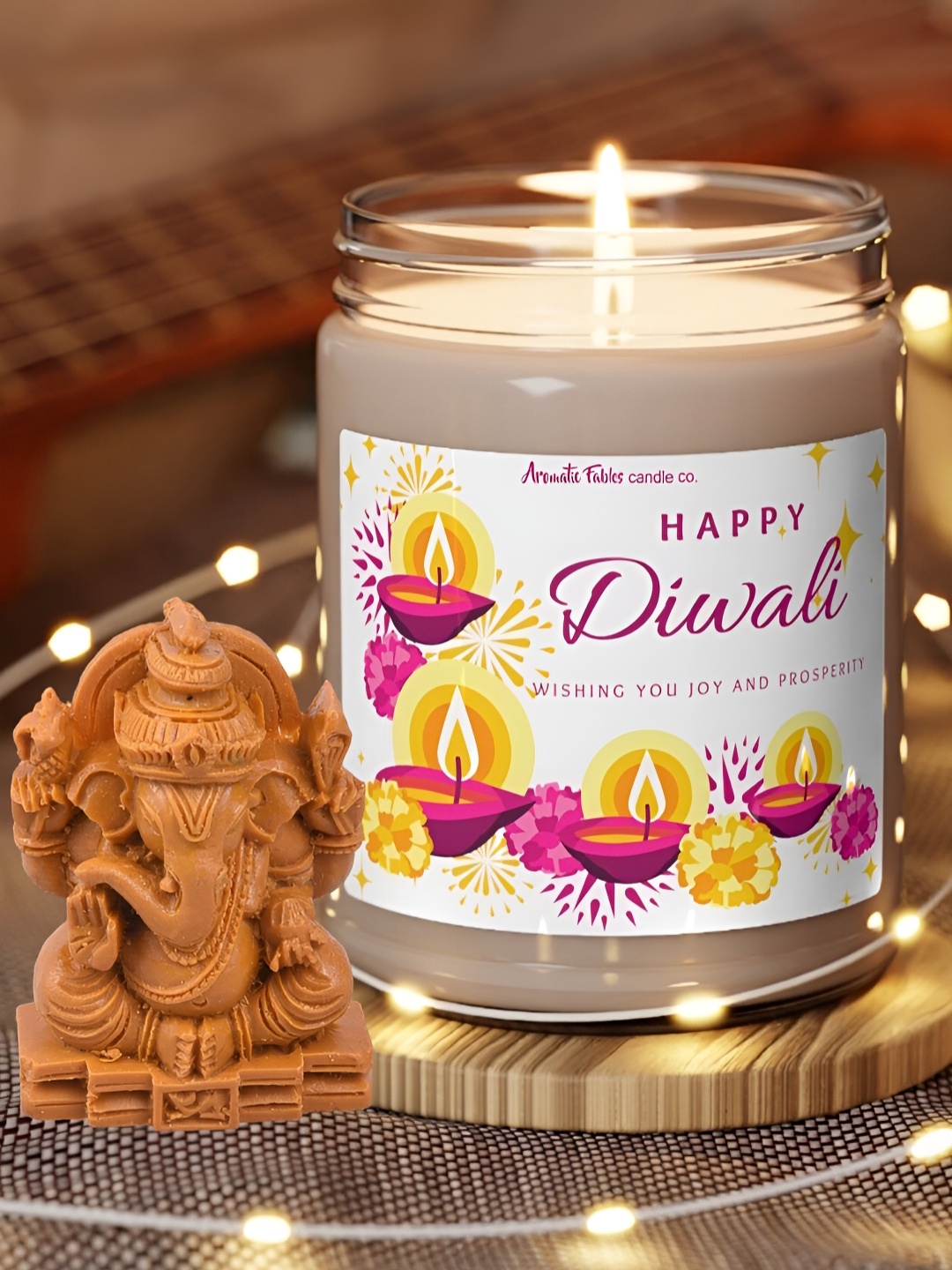 

Aromatic Fables White & Brown Ocean Breeze Glass Jar Candle with Ganesha Idol