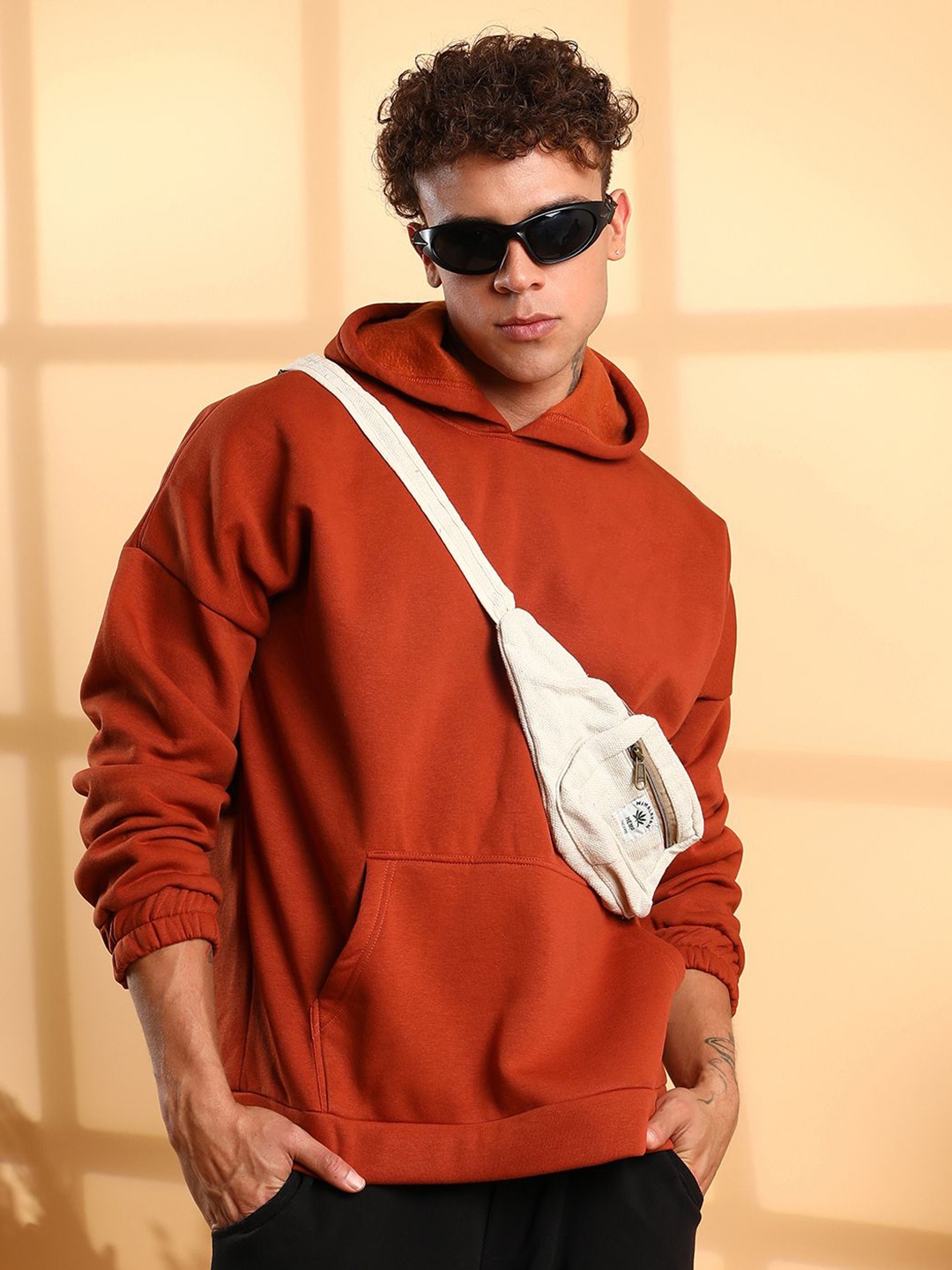 

Campus Sutra Men Hooded Cotton Sweatshirt, Orange