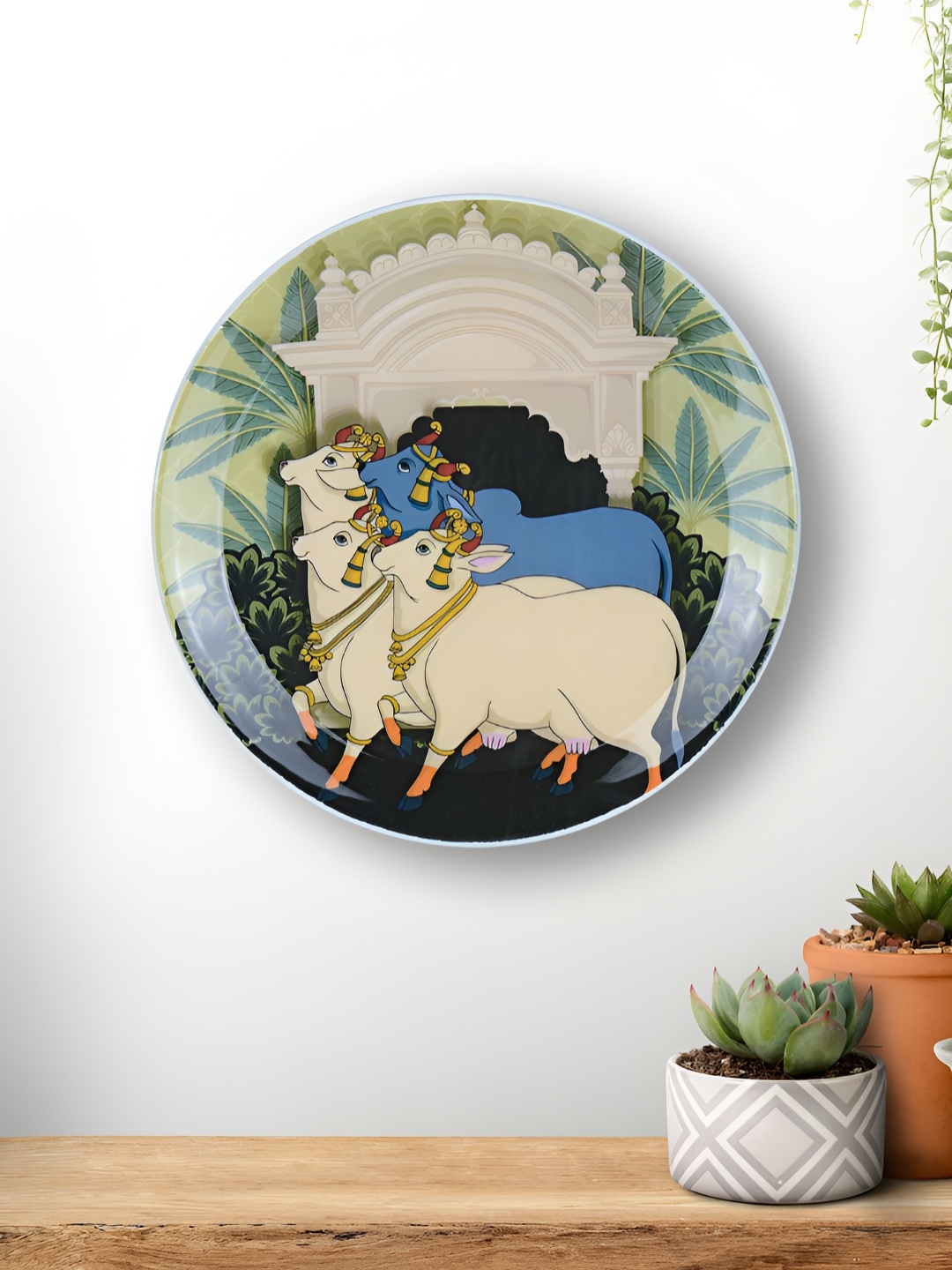 

Maison Modern Pichwai Cow White & Green Printed Printed Iron Round Wall Plate