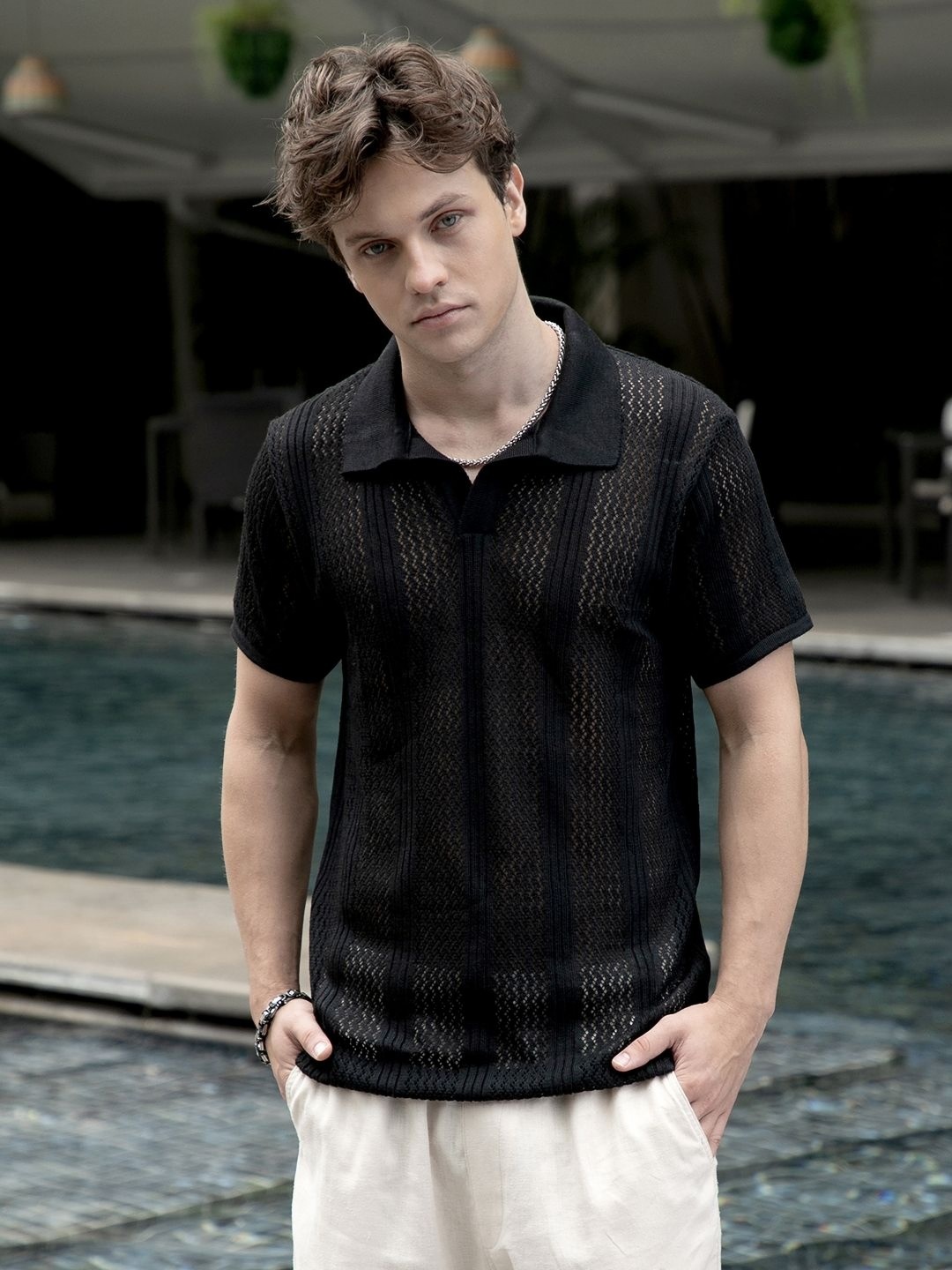 

Campus Sutra Men Self Design Polo Collar Cotton T-shirt, Black