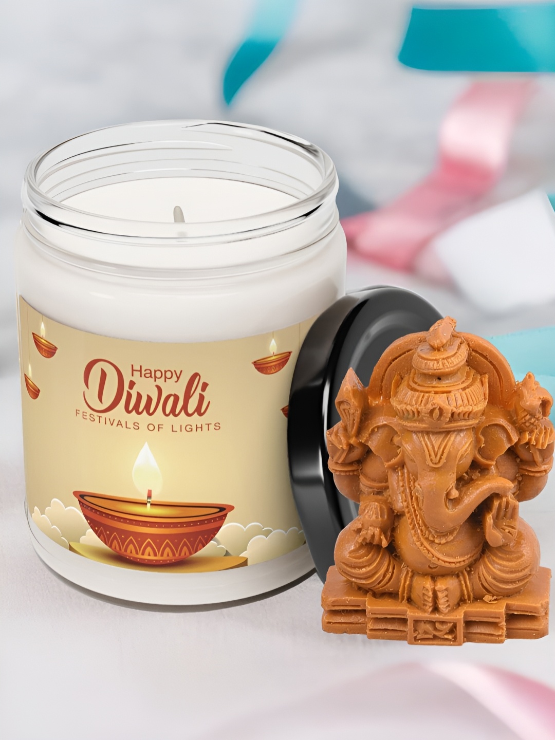 

Aromatic Fables White & Brown Elegant Velvet Rose Scented Glass Jar Candle & Ganesha Idol