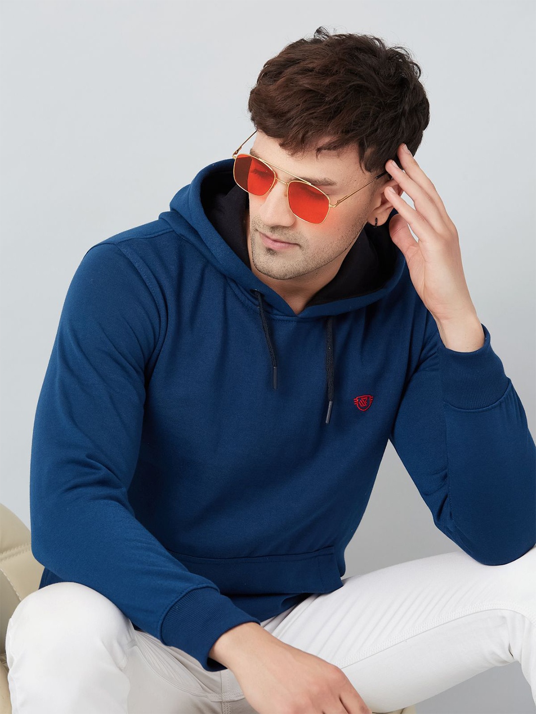 

WE PERFECT Men Solid Hooded Sweatshirt, Blue