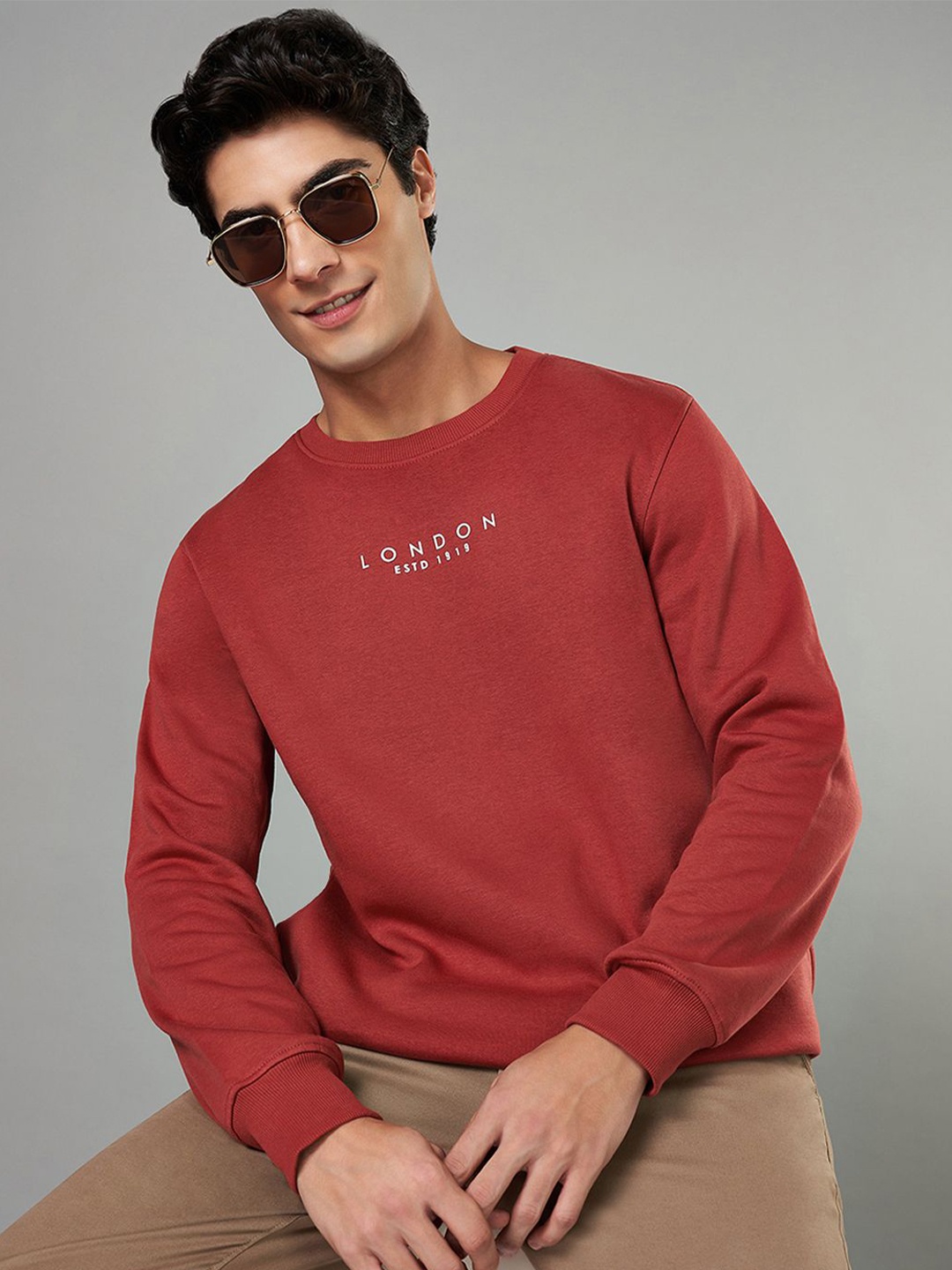 

BYFORD by Pantaloons Men Round Neck Pullover Sweatshirt, Orange
