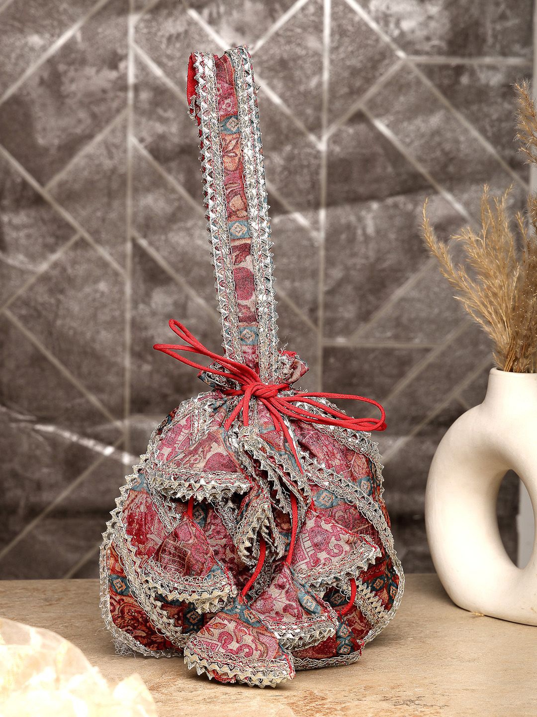 

Dhrohar Embellished Lacework Potli Clutch, Maroon