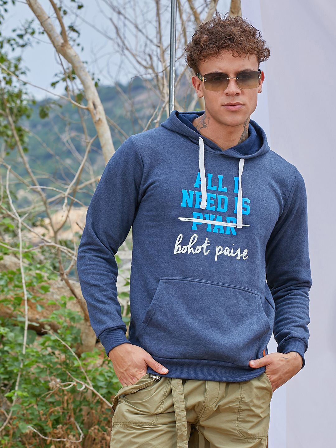 

Campus Sutra Men Blue Printed Long Sleeves Cotton Hooded Sweatshirt