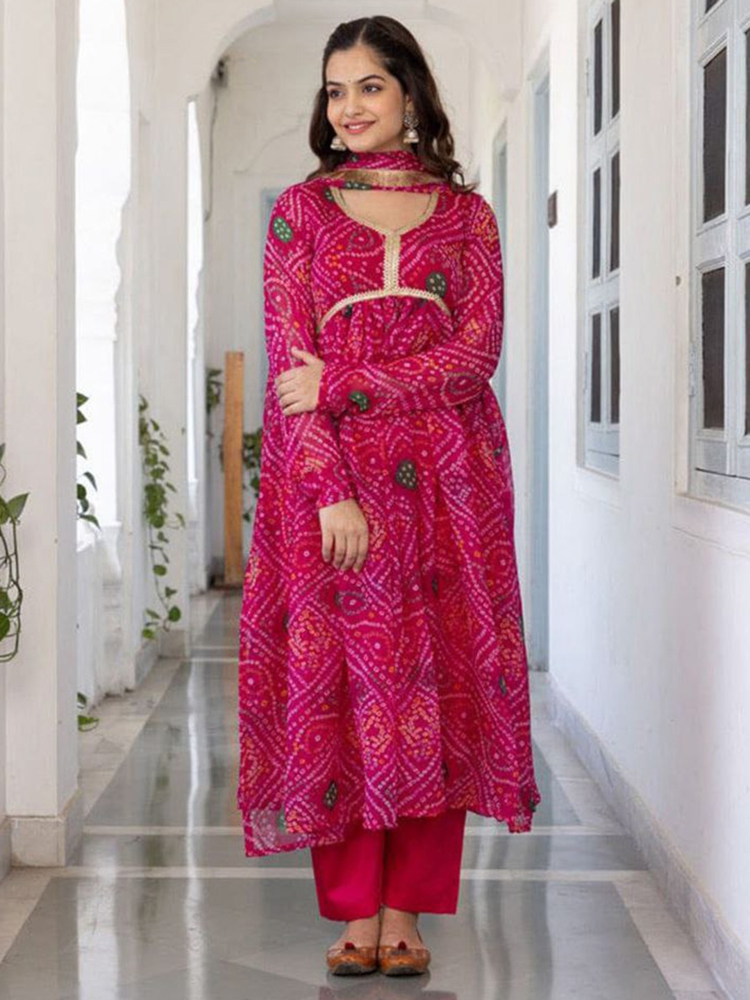 

Jinal & Jinal Bandhani Printed Kurta With Trousers & Dupatta, Magenta