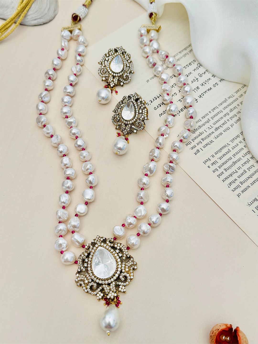 

ABDESIGNS Gold Plated Polki American Diamond Studded & Pearls Beaded Jewellery Set