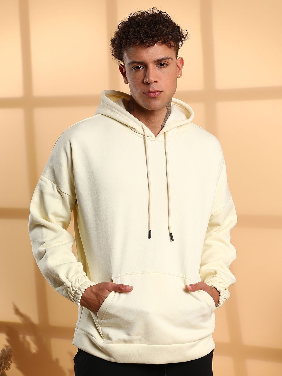 

Campus Sutra Men Hooded Sweatshirt, Yellow