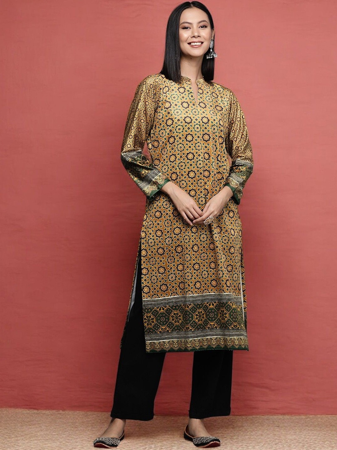 

Ahalyaa Mustard Yellow Ethnic Motifs Printed Mandarin Collar Velvet Straight Kurta