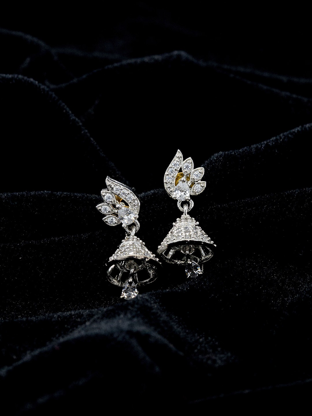 

GOLD CASH Women Floral Motifs Jhumka Earrings, Silver