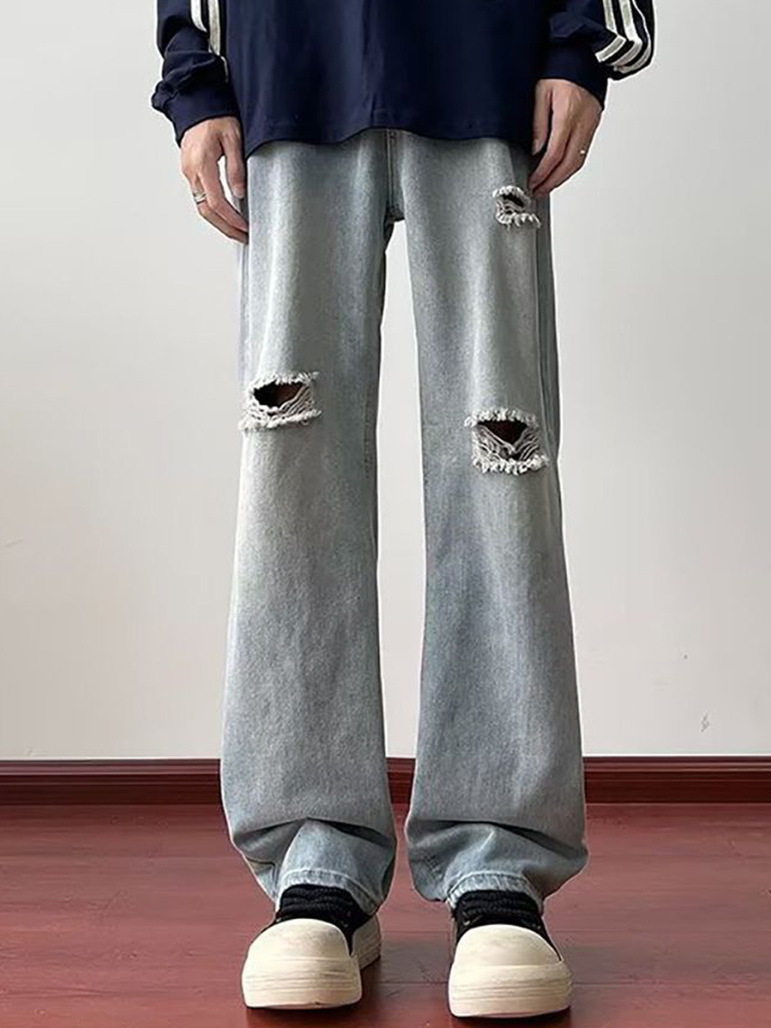 

StyleCast x Revolte Men Straight Fit Mildly Distressed Light Fade Jeans, Blue