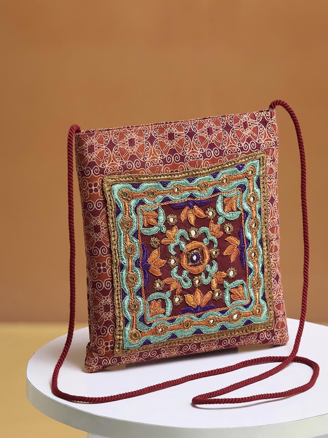 

Fabindia Women Ethnic Motifs Printed Structured Cotton Sling Bag, Maroon