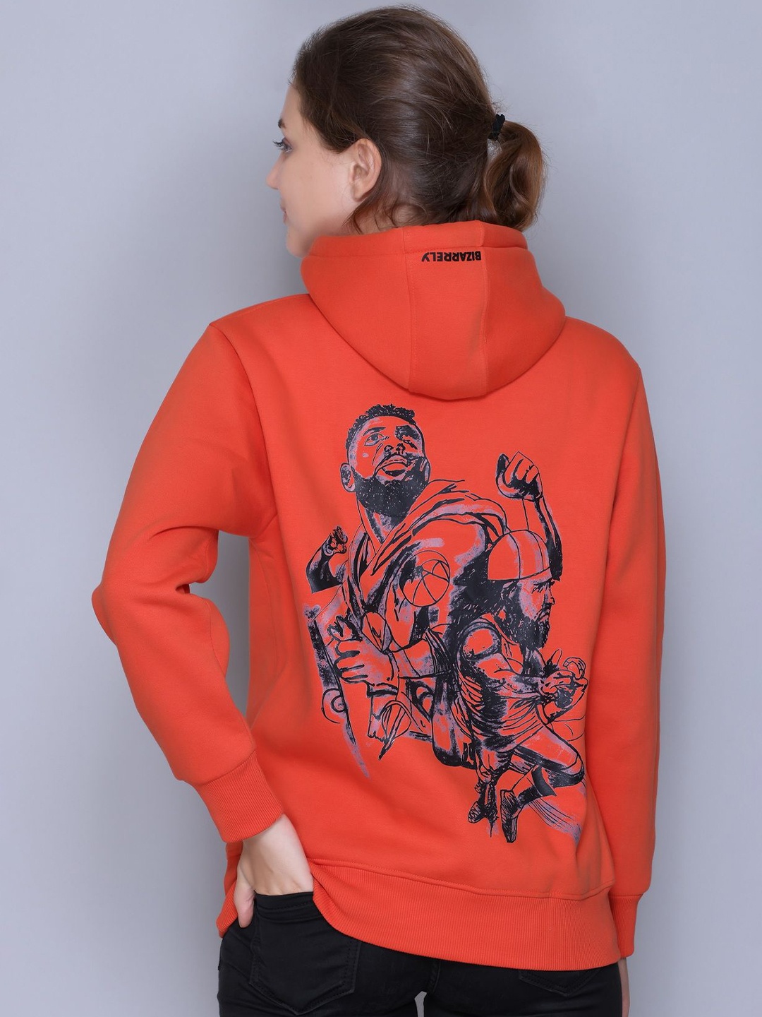 

BIZARRELY Women Stylish Back Printed Hooded Sweatshirt, Orange