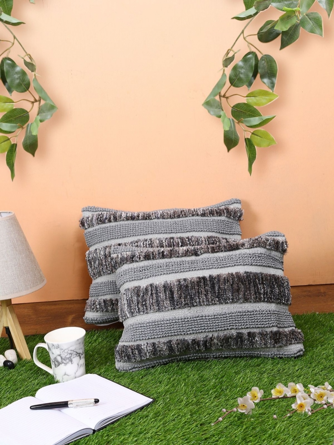 

Myntra Elegant Homes Grey & Black 2 Pieces Striped Woollen Square Cushion Covers