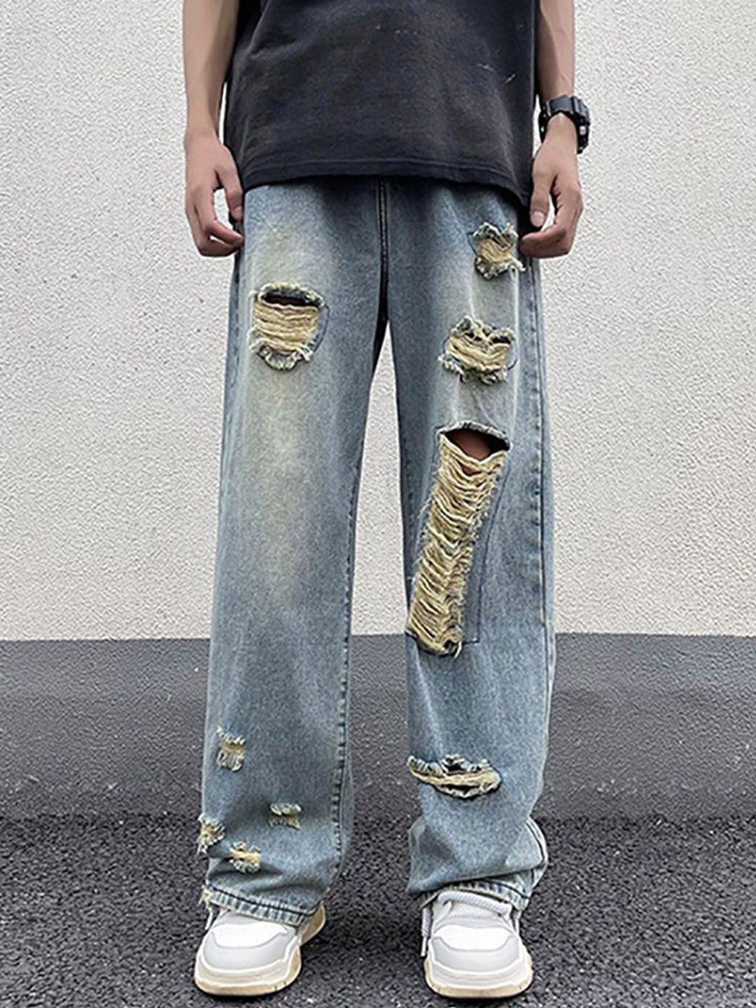 

StyleCast x Revolte Men Highly Distressed Light Fade Jeans, Blue