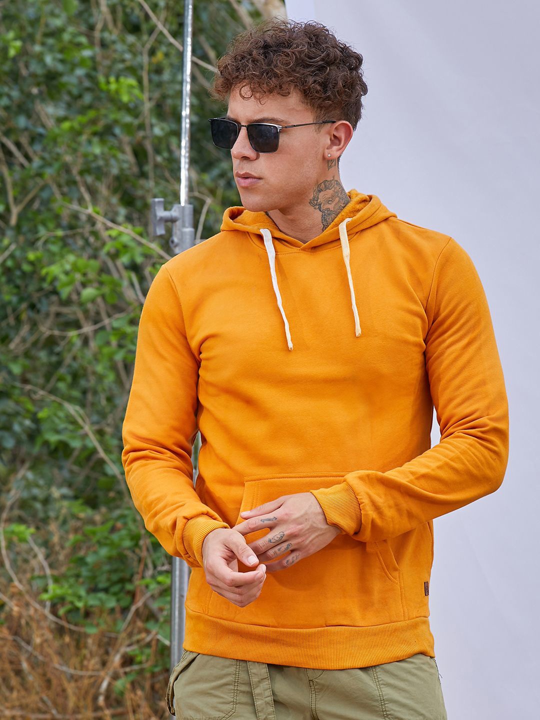 

Campus Sutra Men Long Sleeves Hooded Sweatshirt, Yellow