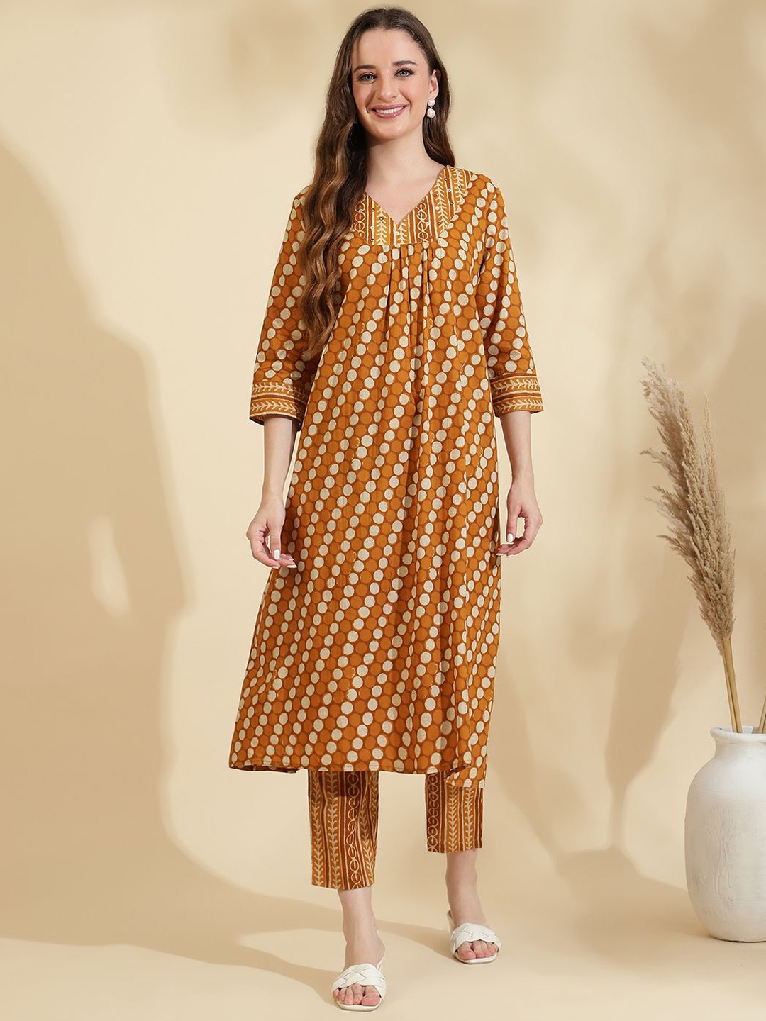 

Sringam Women Printed Regular Pure Cotton Kurta with Trousers, Mustard