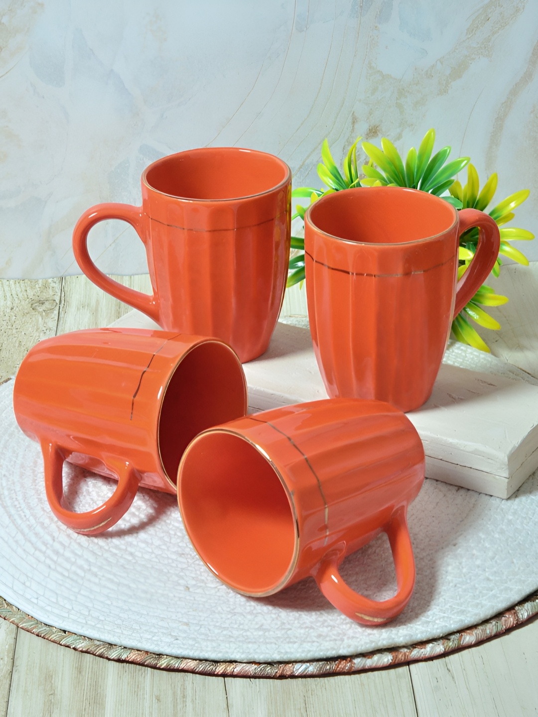 

FABINALIV Orange Coloured 4 Pieces Textured Ceramic Glossy Mugs Set of Cups and Mugs