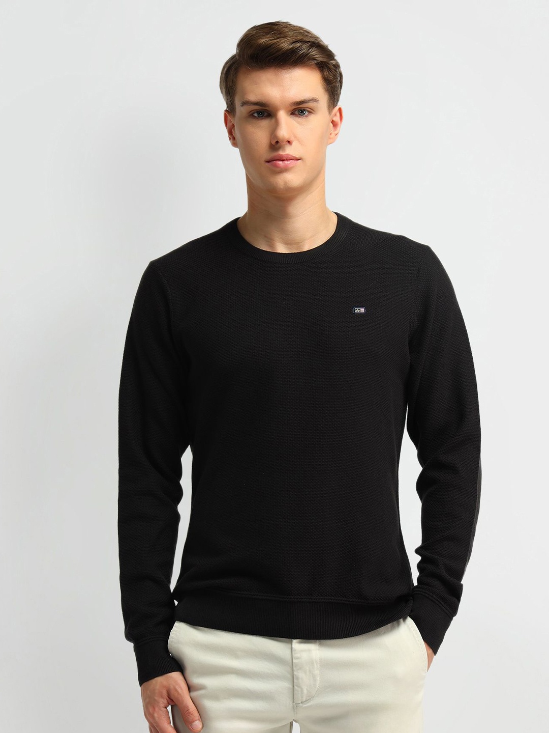 

Arrow Sport Men Solid Pullover, Black