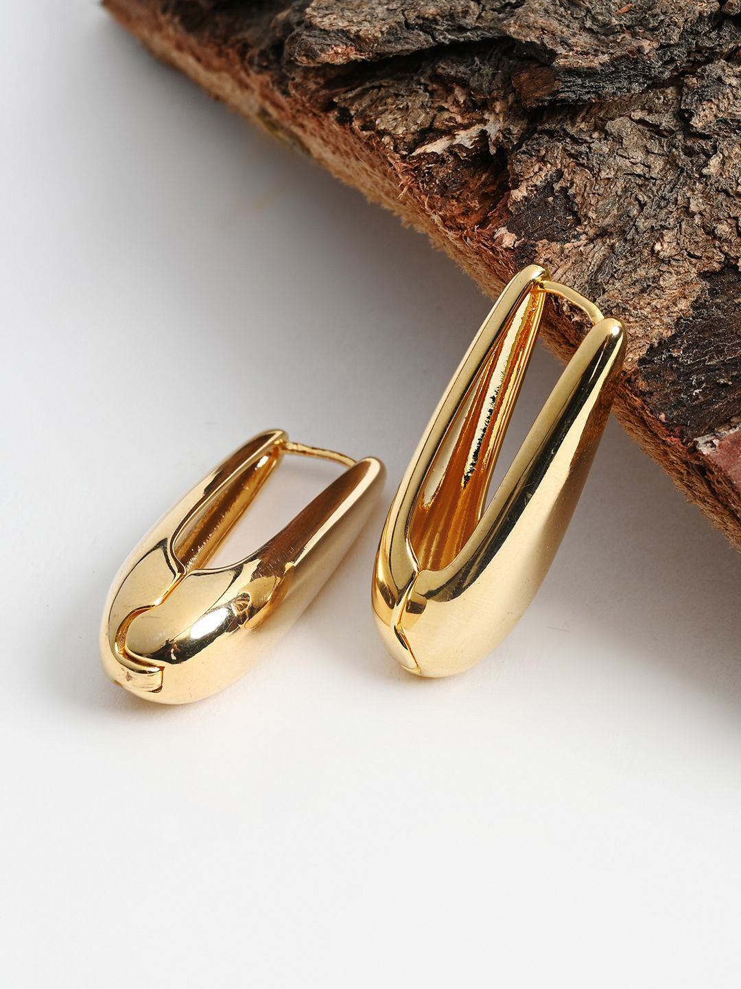 

Kazo Gold-Plated Teardrop Shaped Drop Earrings