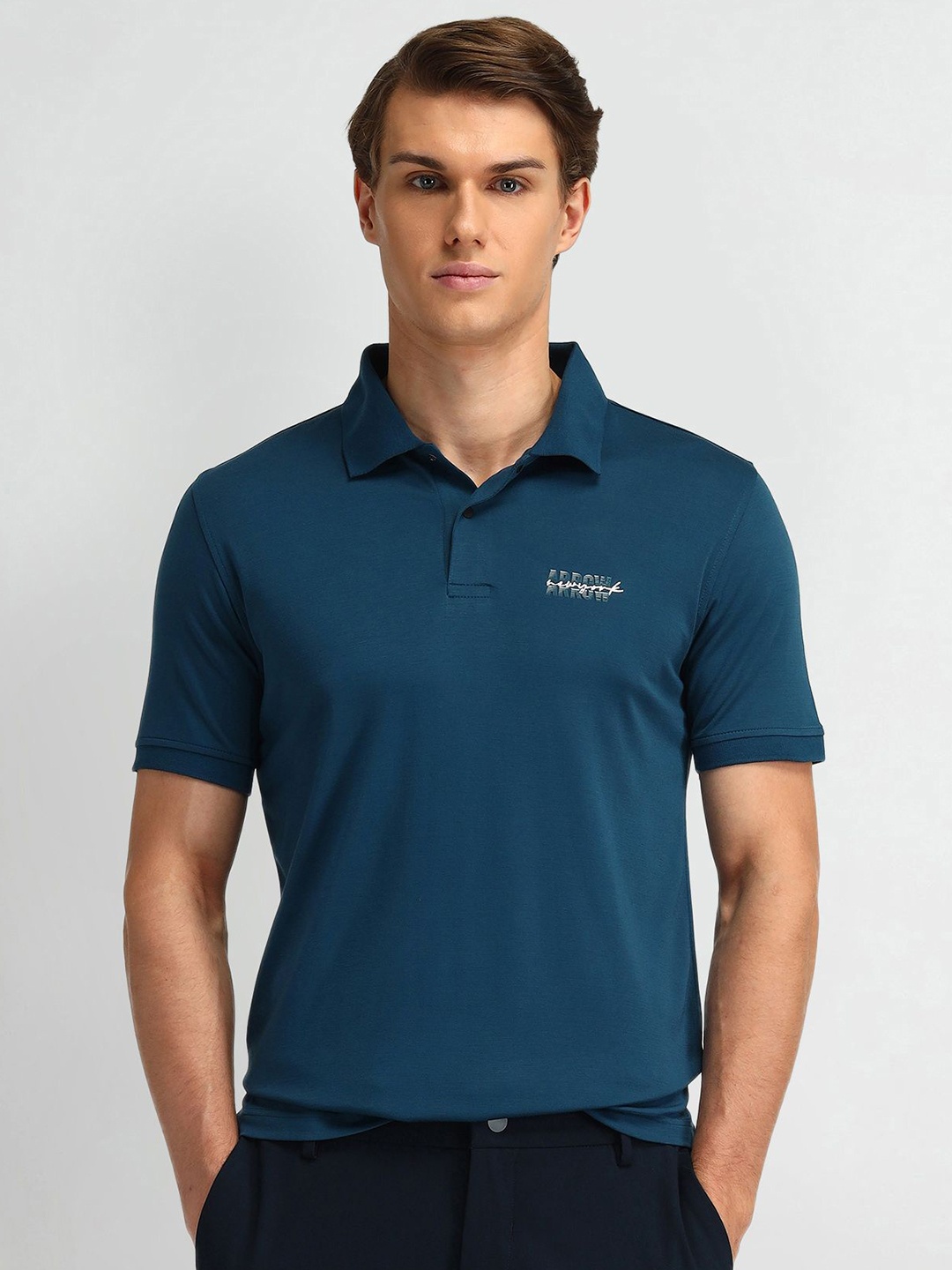 

Arrow New York Men Solid Polo Collar Cotton T-shirt, Blue