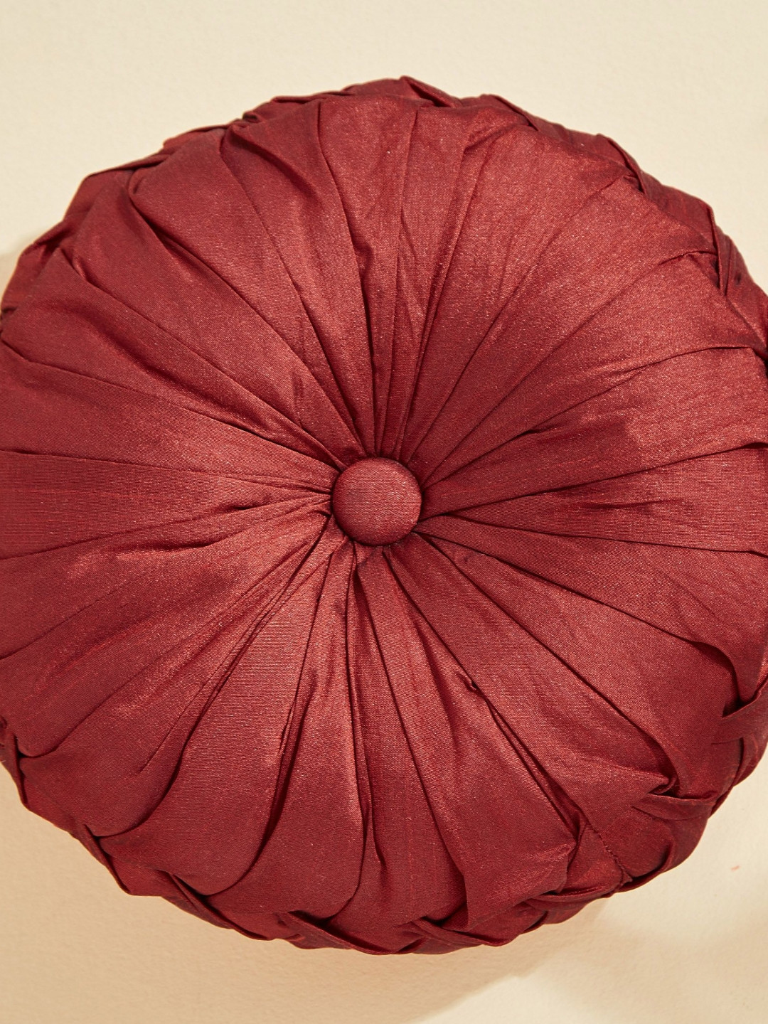 

Home Centre Red Filled Round Cushion