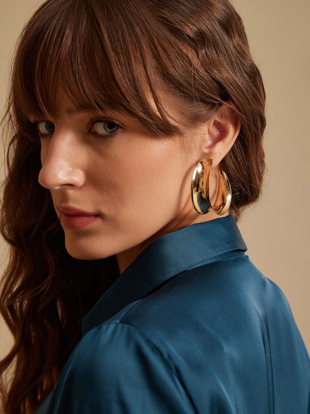 

Kazo Gold Plated Contemporary Hoop Earrings