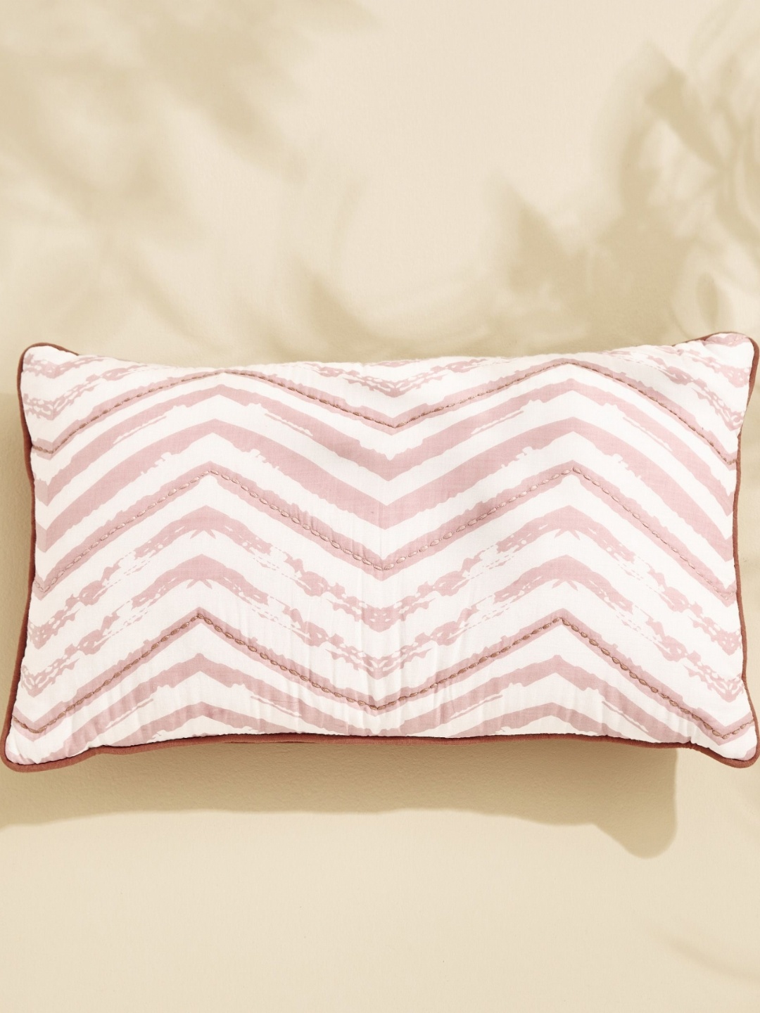 

Home Centre Pink & White Zigzag Printed Rectangle Cotton Filled Cushion