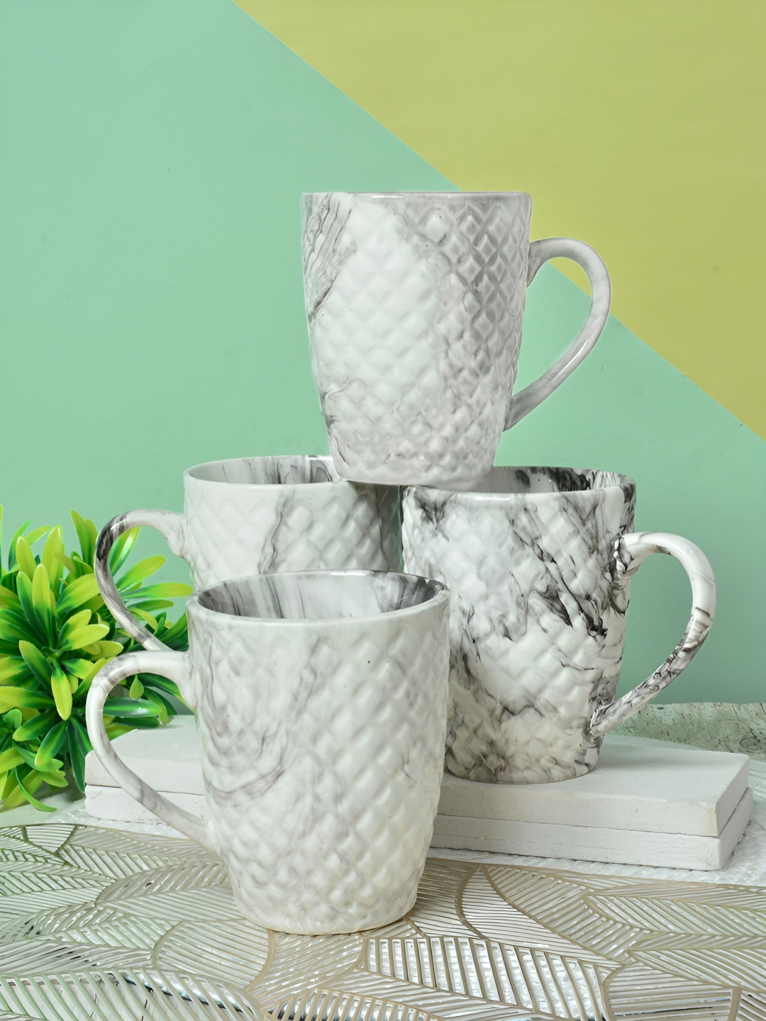 

FABINALIV White & Black 4 Pieces Textured Ceramic Glossy Mugs Set of Cups and Mugs