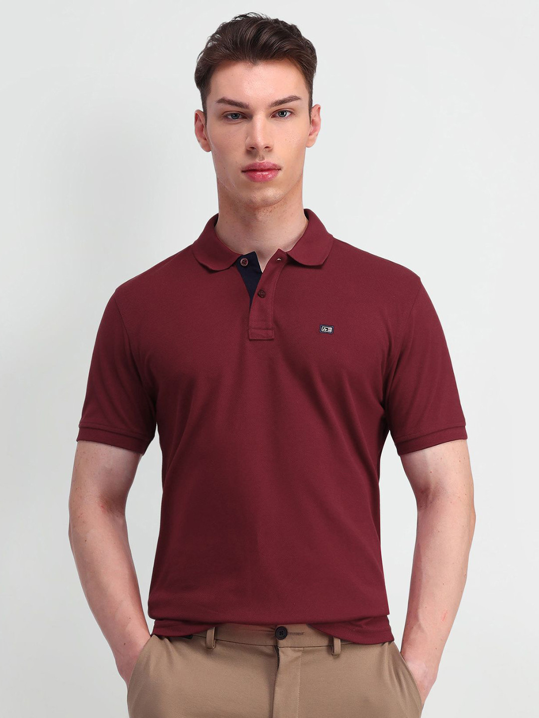 

Arrow Sport Men Brand Logo Polo Collar Pockets T-shirt, Maroon