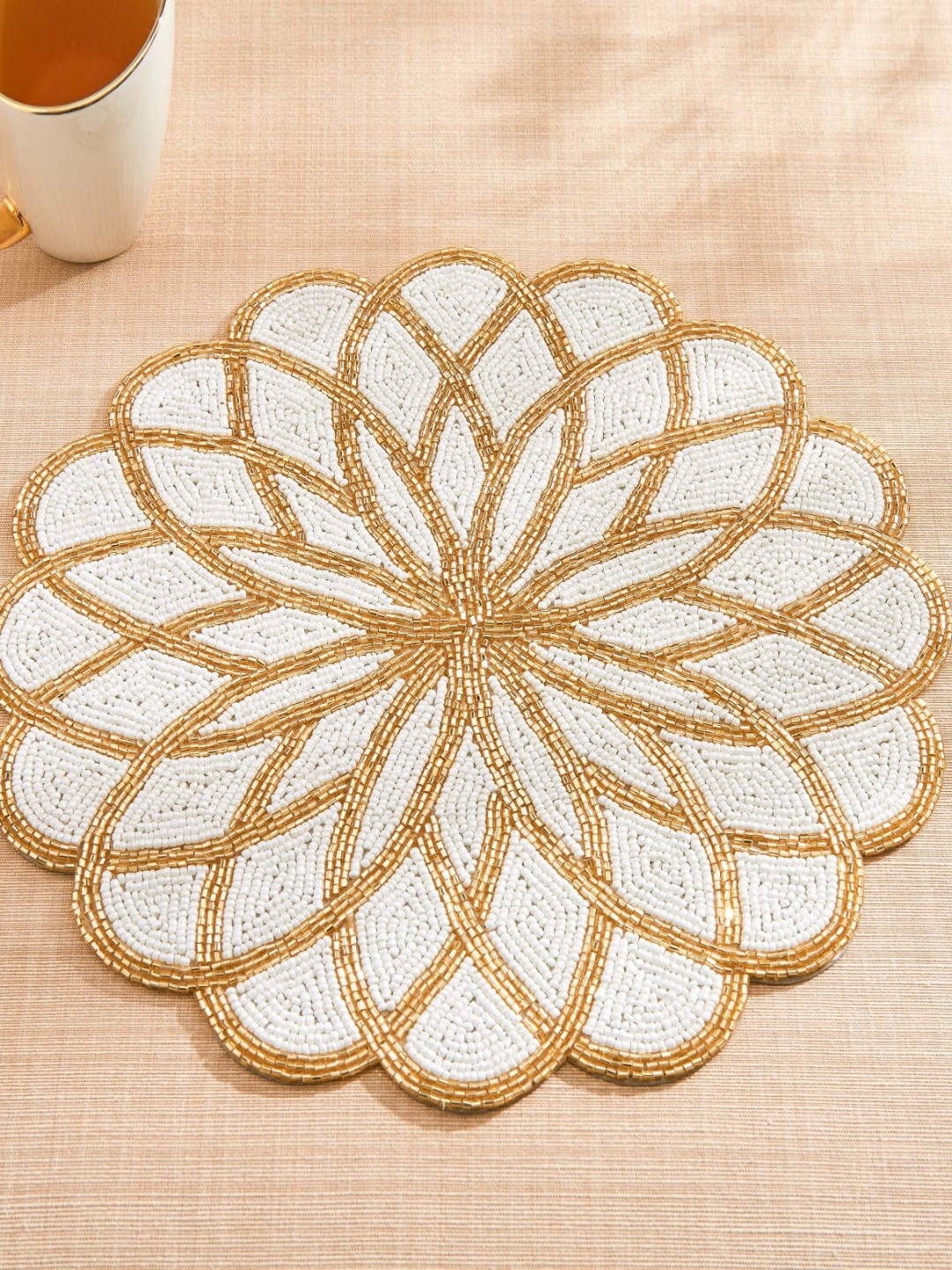 

Home Centre Halcyon White and GoldToned Beaded Round Table Placemats