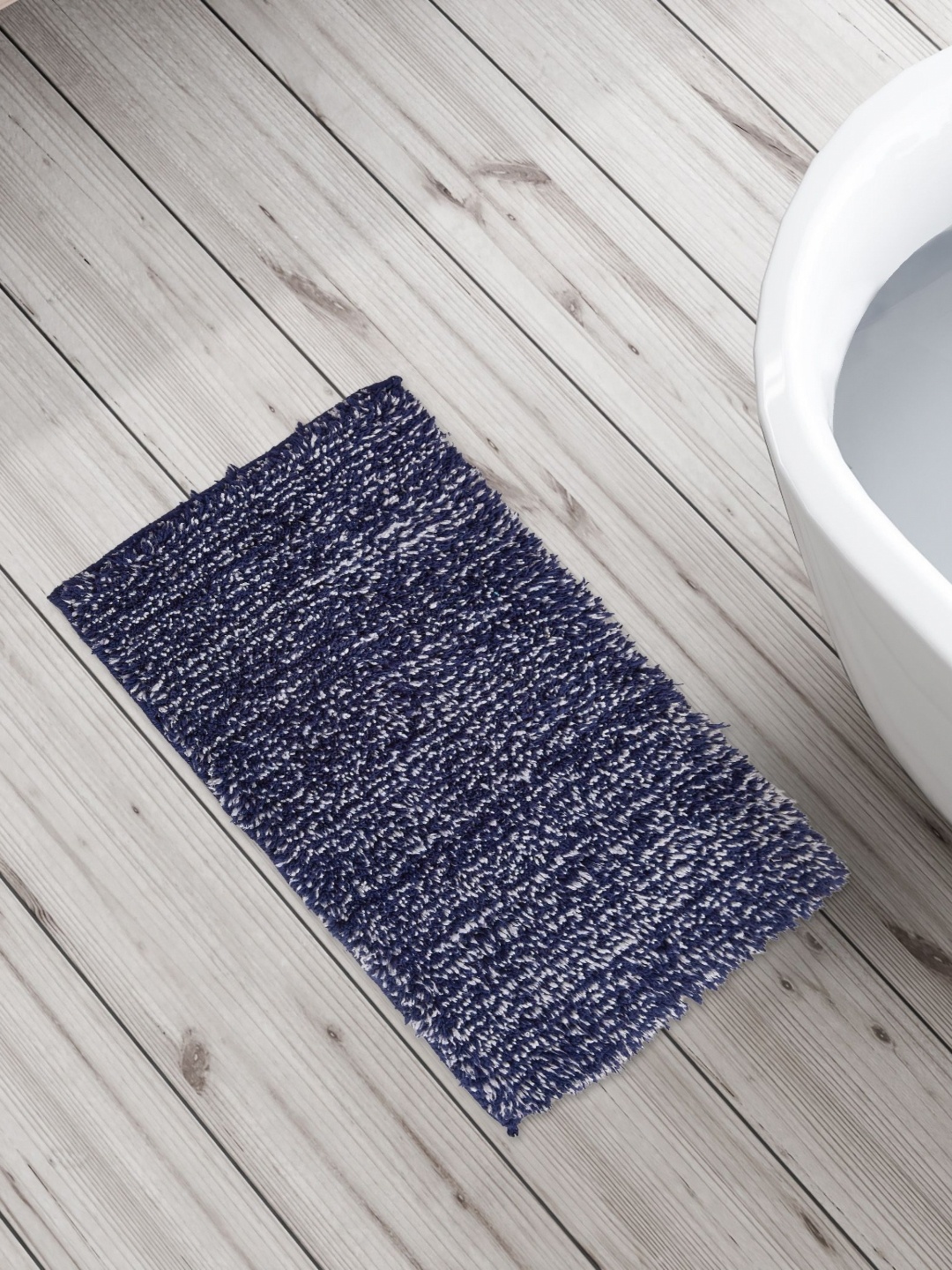 

Home Centre Fiesta Blue & White Textured 350 GSM Anti-Slip Bath Rugs