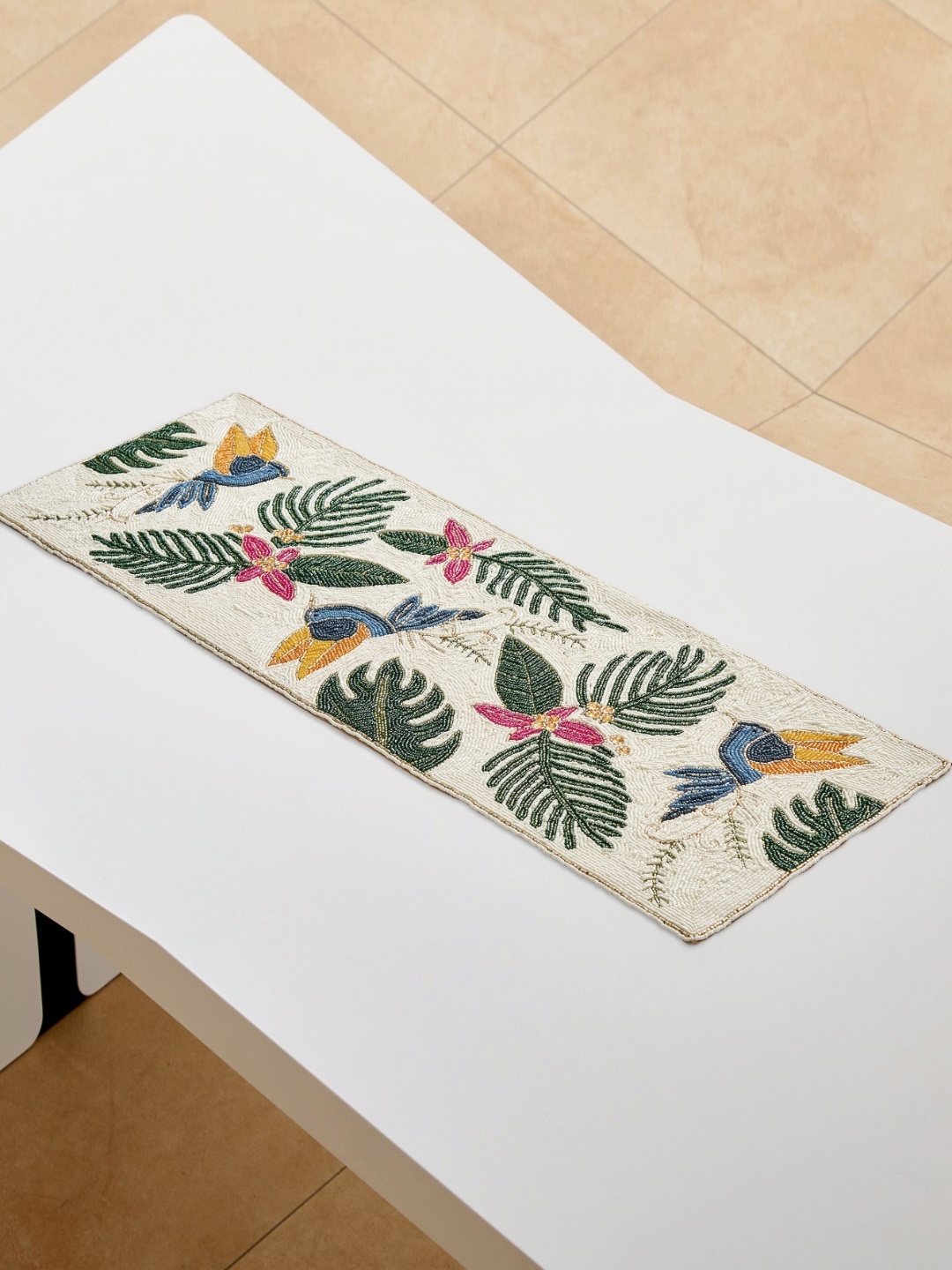 

Home Centre Green and White Corsica Moksha Beaded Table Runner