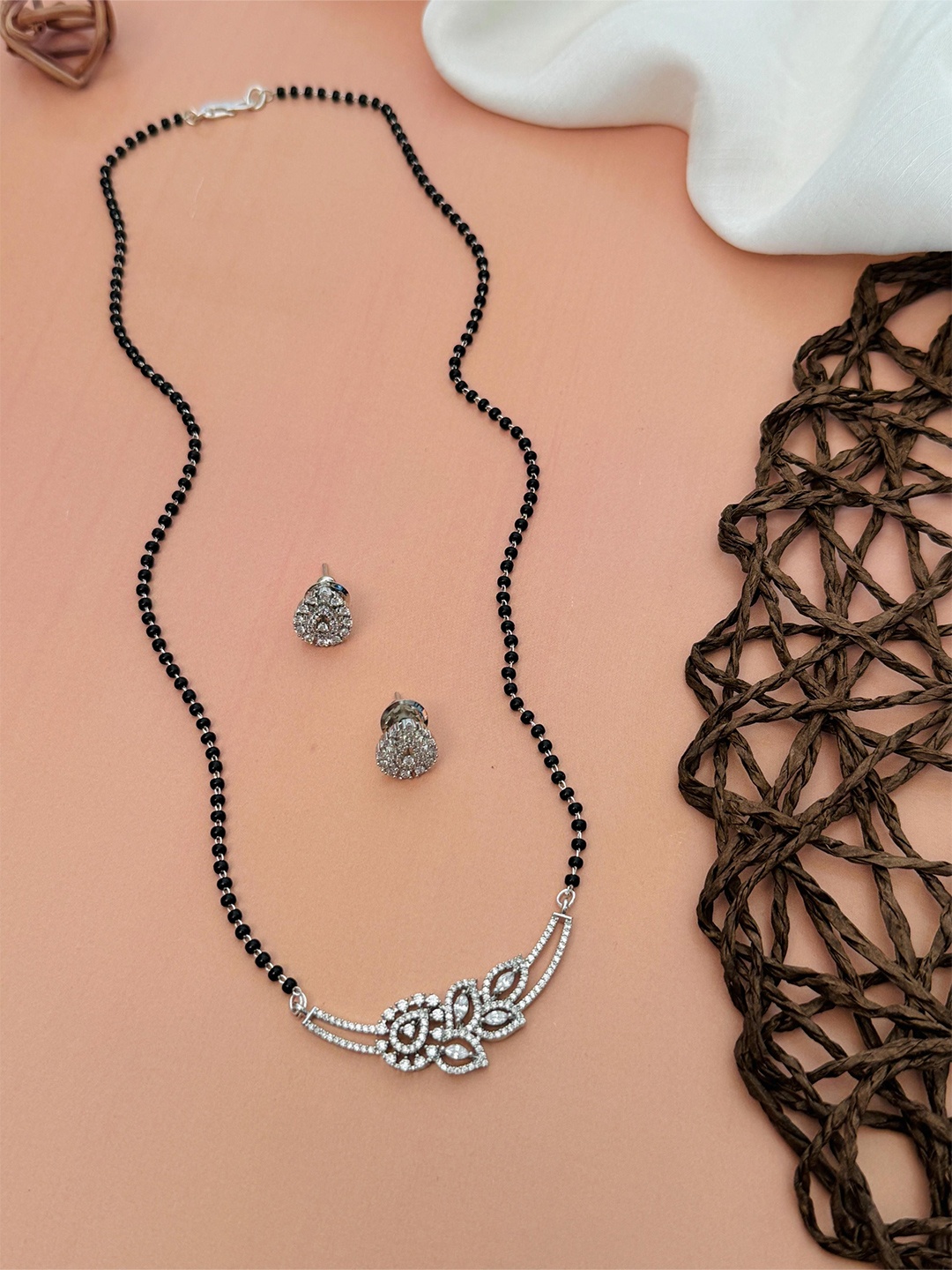 

ABDESIGNS Silver-Plated American Diamond Studded & Beaded Mangalsutra With Earrings