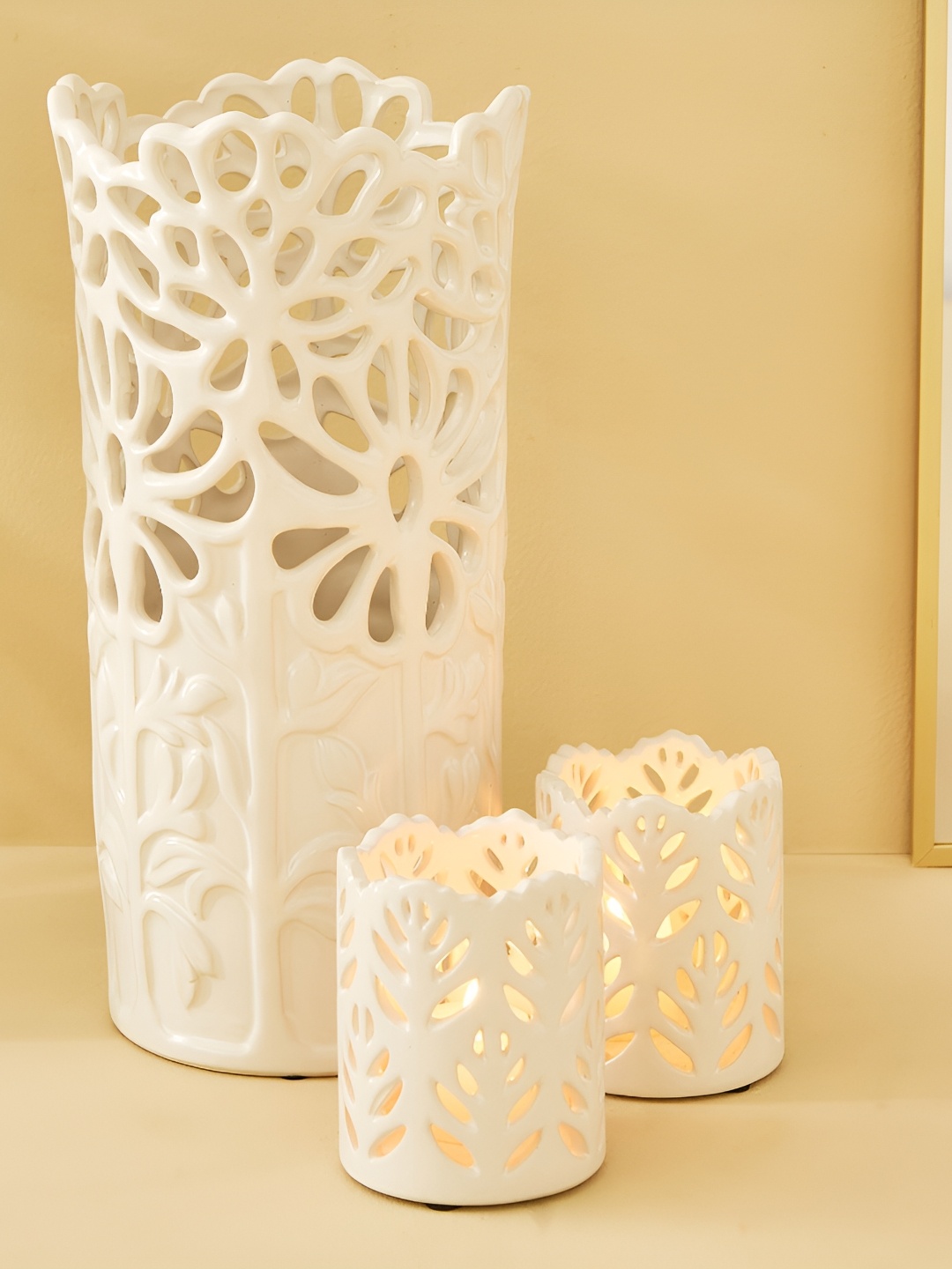 

Home Centre Stellar Fantasy Off White 3 Pieces Textured Stoneware Vase & Candle Holders