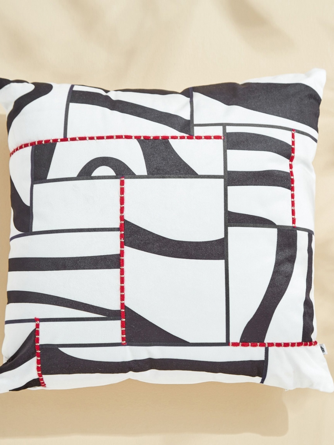 

Home Centre White & Black Thames Printed Square Filled Cushion